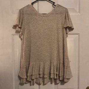 Adorable taupe top with statement bow back!